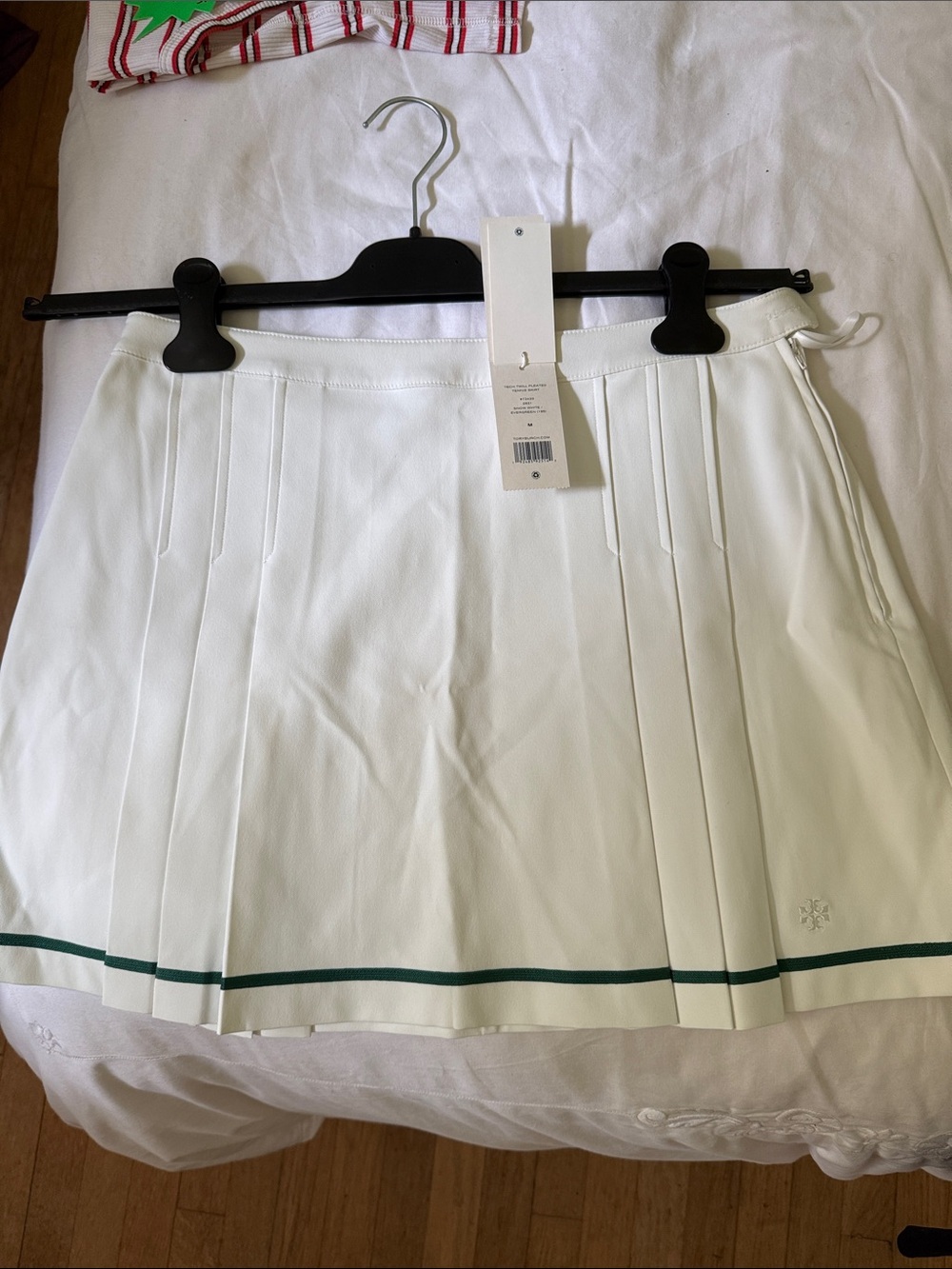 Brand new Tory Sport Women's White Pleated tennis skirt with Green Trim